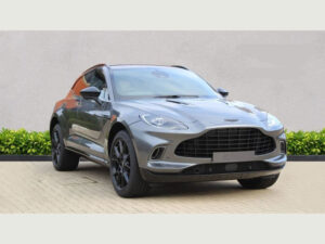 Front three-quarter view of a grey Aston Martin DBX